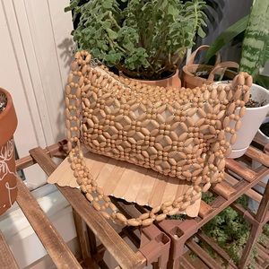 The Saks 1970s style wooden beaded purse